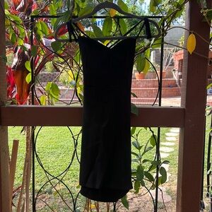 Black, open back mini dress
